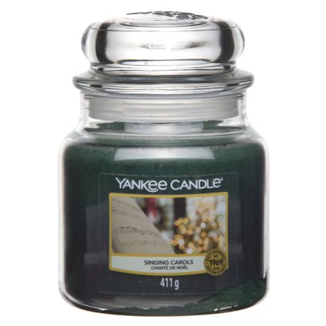 свеча в стекле YANKEE CANDLE Новогодние колядки банка средн. 9х12,8см 90 ч/г аромат.