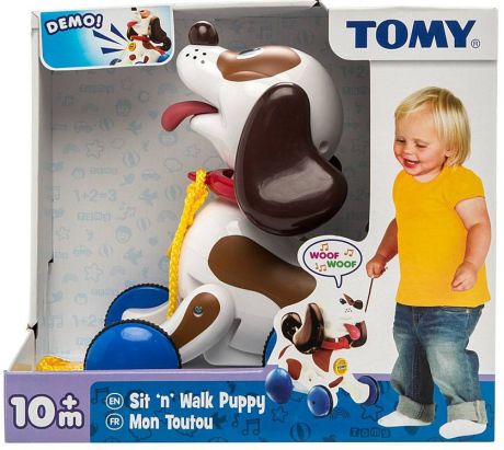 Каталка на шнурке Tomy Веселый щенок на прогулке от 10 месяцев разноцветный пластик музыкальная 8887856918626