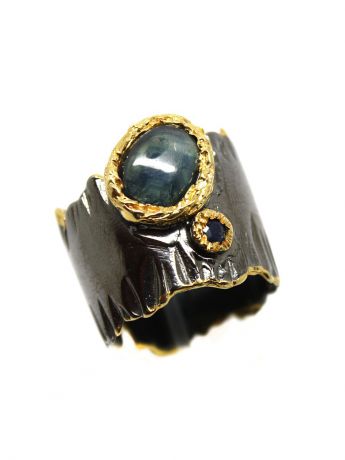 Ювелирные кольца KARMONIA Серебряное кольцо с камнями: звездчатый сапфир.