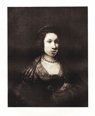 Гравюра Портрет молодой женщины в плаще с меховой отделкой с гвоздикой в руке. Рембрандт Харменс ван Рейн. Гелиогравюра 1899 год