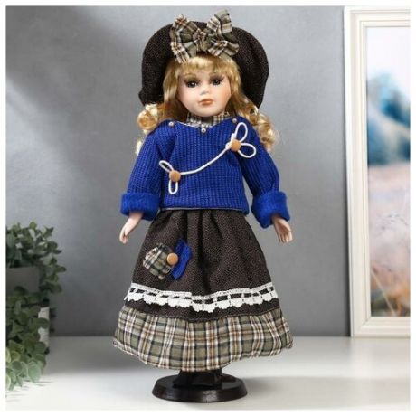 Кукла коллекционная керамика "Блондинка с кудрями, синий свитер с цветком" 40 см