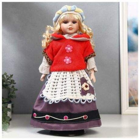 Кукла коллекционная керамика "Блондинка с кудрями, алый свитер с цветочками" 40 см 5483258 .